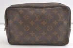 Auth Louis Vuitton Monogram Trousse Toilette 23 Clutch Hand Bag Old Model 8442J Online Hot Sale